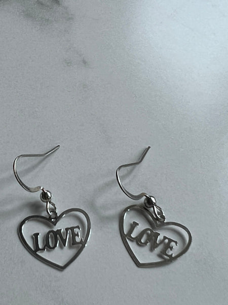 Boucles oreilles coeurs love argent Comme un ange