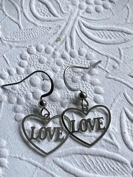 Boucles oreilles coeurs love argent Comme un ange