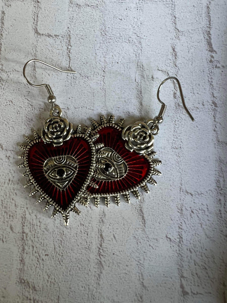 Boucles d’oreilles breloque coeur oeil rouge et argent Comme un ange