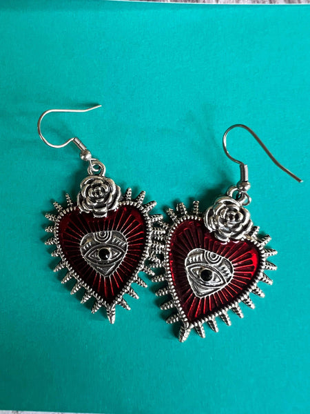 Boucles d’oreilles breloque coeur oeil rouge et argent Comme un ange