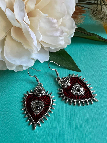 Boucles d’oreilles breloque coeur oeil rouge et argent Comme un ange
